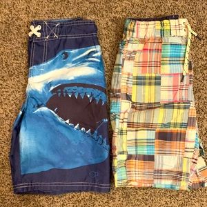 (2) Boys swim trunks. Both size M. Good condition. Various brands.